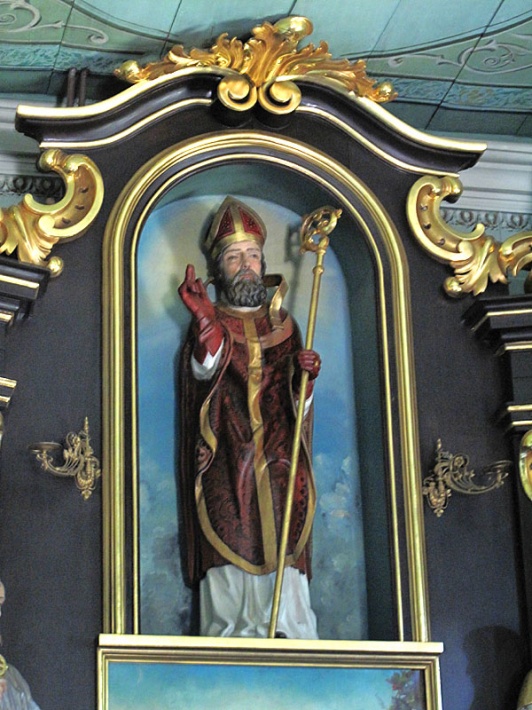 Kalisz - kościół św. Wojciecha, figura św. Wojciecha w zwieńczeniu ołtarza
