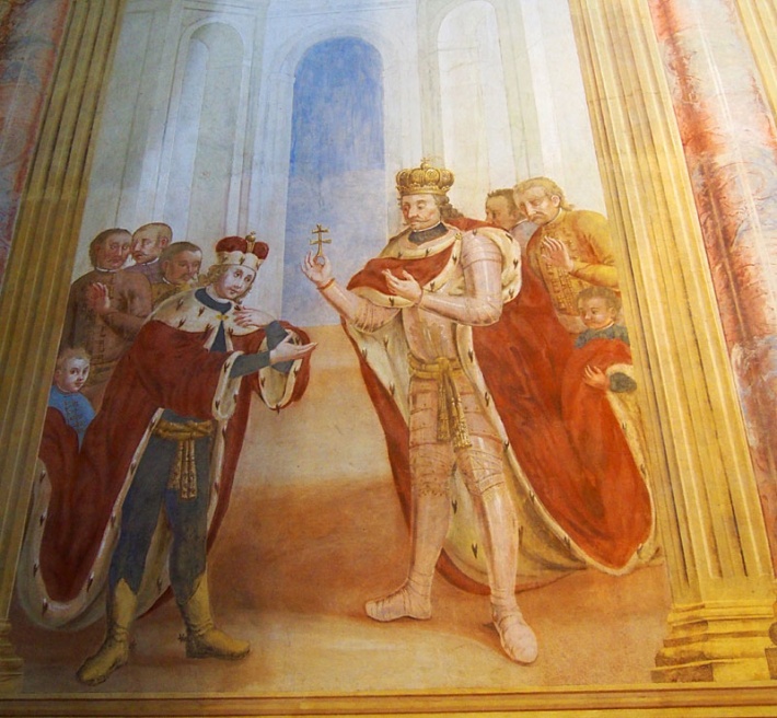 książę Emeryk otrzymuje od ojca Stefana I, króla Węgier, relikwie Krzyża Świętego, aby strzegły syna w dalekiej podróży do Polski